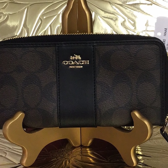 Coach Handbags - COACH BLACK/BROWN COACH ACCORDION ZIP WALLET IN SIGNATURE CANVAS